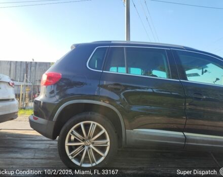 Чорний Фольксваген Тігуан, об'ємом двигуна 2 л та пробігом 156 тис. км за 7000 $, фото 4 на Automoto.ua