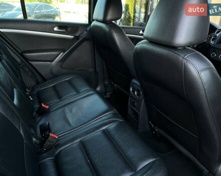 Чорний Фольксваген Тігуан, об'ємом двигуна 2 л та пробігом 159 тис. км за 14950 $, фото 28 на Automoto.ua
