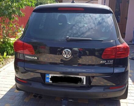 Чорний Фольксваген Тігуан, об'ємом двигуна 2 л та пробігом 200 тис. км за 12700 $, фото 1 на Automoto.ua