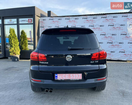 Чорний Фольксваген Тігуан, об'ємом двигуна 2 л та пробігом 159 тис. км за 14950 $, фото 5 на Automoto.ua