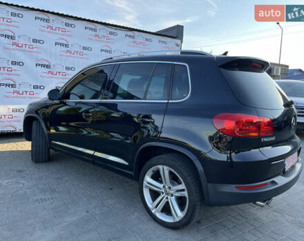 Чорний Фольксваген Тігуан, об'ємом двигуна 2 л та пробігом 159 тис. км за 14950 $, фото 4 на Automoto.ua