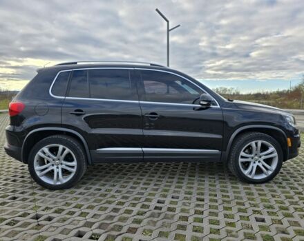 Чорний Фольксваген Тігуан, об'ємом двигуна 2 л та пробігом 194 тис. км за 12499 $, фото 2 на Automoto.ua