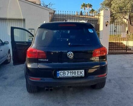 Чорний Фольксваген Тігуан, об'ємом двигуна 2 л та пробігом 231 тис. км за 12000 $, фото 4 на Automoto.ua