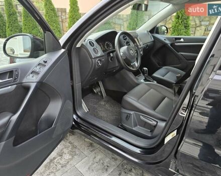 Чорний Фольксваген Тігуан, об'ємом двигуна 2 л та пробігом 169 тис. км за 13550 $, фото 9 на Automoto.ua