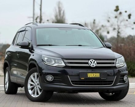 Чорний Фольксваген Тігуан, об'ємом двигуна 2 л та пробігом 145 тис. км за 12650 $, фото 2 на Automoto.ua