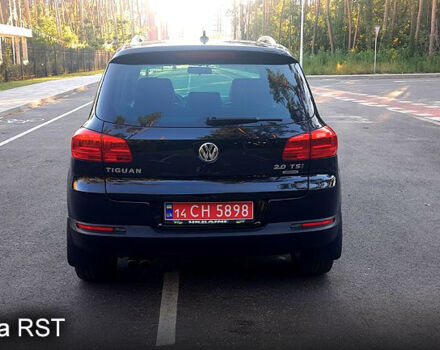 Чорний Фольксваген Тігуан, об'ємом двигуна 2 л та пробігом 220 тис. км за 12800 $, фото 6 на Automoto.ua