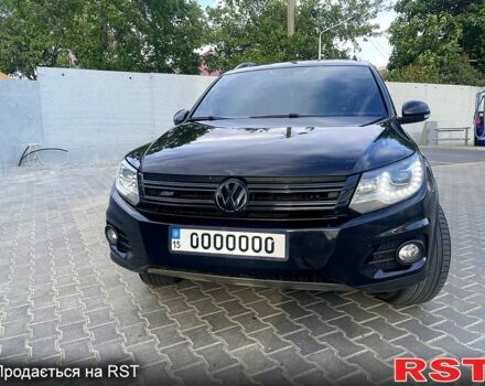 Черный Фольксваген Тигуан, объемом двигателя 2 л и пробегом 246 тыс. км за 9000 $, фото 1 на Automoto.ua