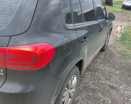 Чорний Фольксваген Тігуан, об'ємом двигуна 2 л та пробігом 340 тис. км за 14500 $, фото 2 на Automoto.ua