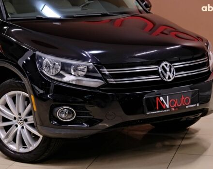 Черный Фольксваген Тигуан, объемом двигателя 2 л и пробегом 195 тыс. км за 11900 $, фото 2 на Automoto.ua