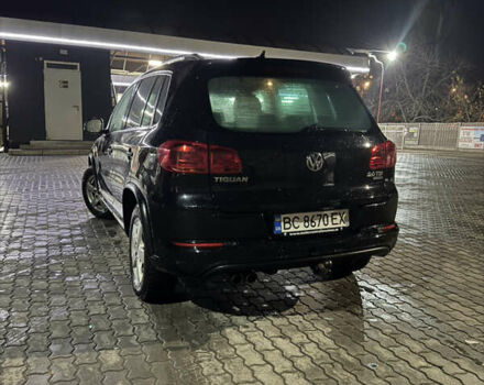 Чорний Фольксваген Тігуан, об'ємом двигуна 2 л та пробігом 291 тис. км за 17000 $, фото 1 на Automoto.ua