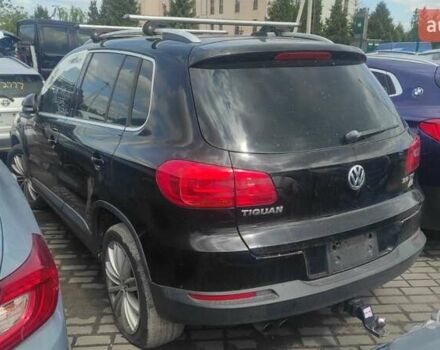 Чорний Фольксваген Тігуан, об'ємом двигуна 2 л та пробігом 210 тис. км за 7800 $, фото 2 на Automoto.ua