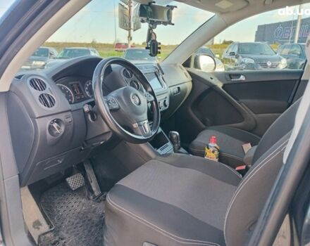 Чорний Фольксваген Тігуан, об'ємом двигуна 2 л та пробігом 255 тис. км за 13440 $, фото 17 на Automoto.ua