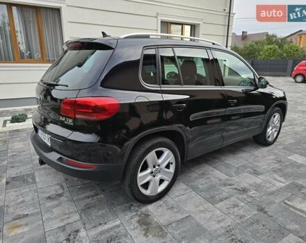 Чорний Фольксваген Тігуан, об'ємом двигуна 2 л та пробігом 169 тис. км за 13550 $, фото 1 на Automoto.ua