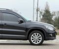 Чорний Фольксваген Тігуан, об'ємом двигуна 2 л та пробігом 145 тис. км за 12650 $, фото 7 на Automoto.ua