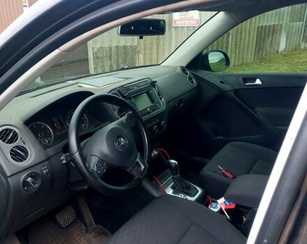 Черный Фольксваген Тигуан, объемом двигателя 2 л и пробегом 340 тыс. км за 14500 $, фото 2 на Automoto.ua