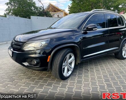 Черный Фольксваген Тигуан, объемом двигателя 2 л и пробегом 246 тыс. км за 9000 $, фото 2 на Automoto.ua