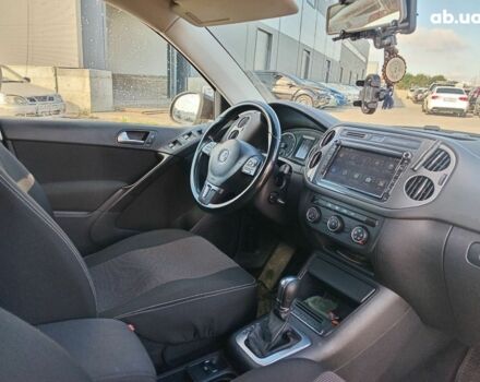 Чорний Фольксваген Тігуан, об'ємом двигуна 2 л та пробігом 255 тис. км за 13440 $, фото 4 на Automoto.ua