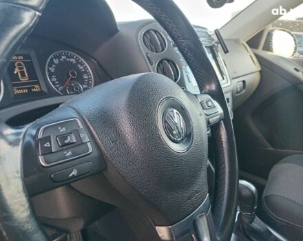 Чорний Фольксваген Тігуан, об'ємом двигуна 2 л та пробігом 255 тис. км за 13440 $, фото 14 на Automoto.ua