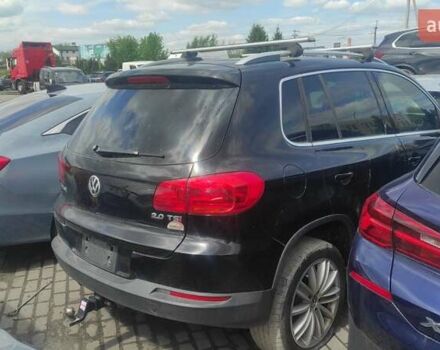 Чорний Фольксваген Тігуан, об'ємом двигуна 2 л та пробігом 210 тис. км за 7800 $, фото 3 на Automoto.ua