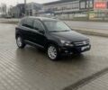 Чорний Фольксваген Тігуан, об'ємом двигуна 1.98 л та пробігом 180 тис. км за 14000 $, фото 1 на Automoto.ua