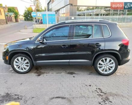 Чорний Фольксваген Тігуан, об'ємом двигуна 1.98 л та пробігом 246 тис. км за 12500 $, фото 1 на Automoto.ua