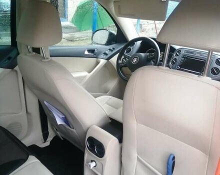 Чорний Фольксваген Тігуан, об'ємом двигуна 2 л та пробігом 99 тис. км за 15000 $, фото 14 на Automoto.ua