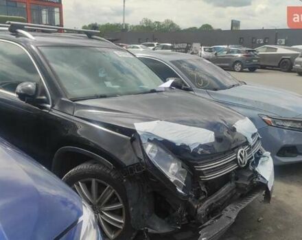 Чорний Фольксваген Тігуан, об'ємом двигуна 2 л та пробігом 210 тис. км за 7800 $, фото 1 на Automoto.ua