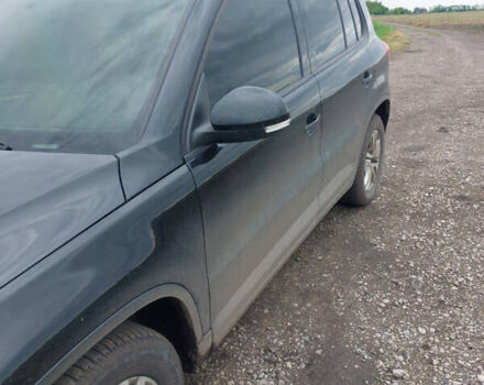 Чорний Фольксваген Тігуан, об'ємом двигуна 2 л та пробігом 340 тис. км за 14500 $, фото 1 на Automoto.ua