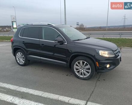 Черный Фольксваген Тигуан, объемом двигателя 2 л и пробегом 172 тыс. км за 12000 $, фото 1 на Automoto.ua