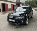 Черный Фольксваген Тигуан, объемом двигателя 1.97 л и пробегом 198 тыс. км за 23000 $, фото 1 на Automoto.ua