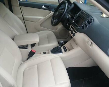 Чорний Фольксваген Тігуан, об'ємом двигуна 2 л та пробігом 99 тис. км за 15000 $, фото 2 на Automoto.ua