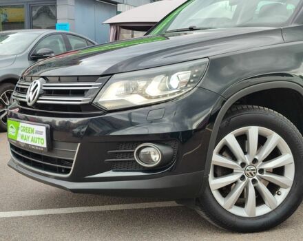 Чорний Фольксваген Тігуан, об'ємом двигуна 2 л та пробігом 150 тис. км за 18799 $, фото 2 на Automoto.ua