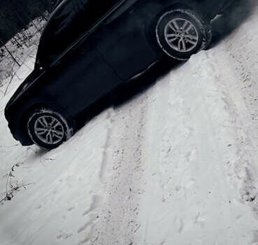 Черный Фольксваген Тигуан, объемом двигателя 2 л и пробегом 181 тыс. км за 11350 $, фото 2 на Automoto.ua