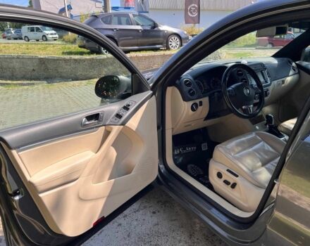 Черный Фольксваген Тигуан, объемом двигателя 1.8 л и пробегом 170 тыс. км за 12700 $, фото 18 на Automoto.ua