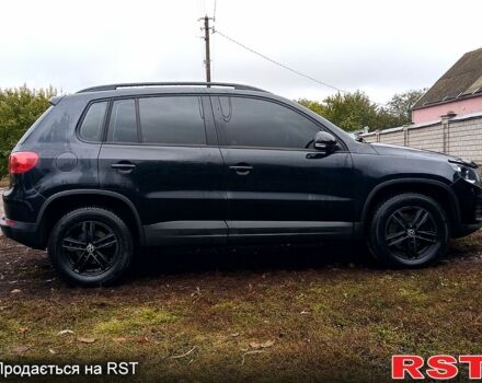 Чорний Фольксваген Тігуан, об'ємом двигуна 2 л та пробігом 145 тис. км за 11500 $, фото 3 на Automoto.ua