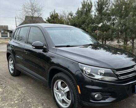 Черный Фольксваген Тигуан, объемом двигателя 1.98 л и пробегом 180 тыс. км за 12800 $, фото 1 на Automoto.ua