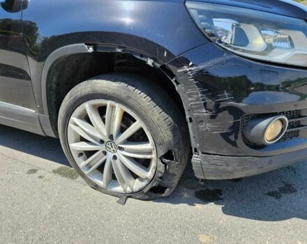 Чорний Фольксваген Тігуан, об'ємом двигуна 2 л та пробігом 125 тис. км за 3850 $, фото 4 на Automoto.ua