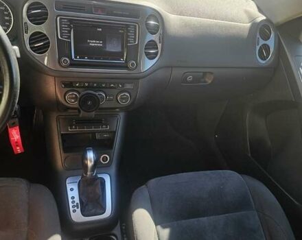 Черный Фольксваген Тигуан, объемом двигателя 2 л и пробегом 201 тыс. км за 14000 $, фото 1 на Automoto.ua