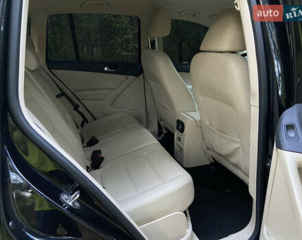 Черный Фольксваген Тигуан, объемом двигателя 1.98 л и пробегом 99 тыс. км за 16000 $, фото 1 на Automoto.ua