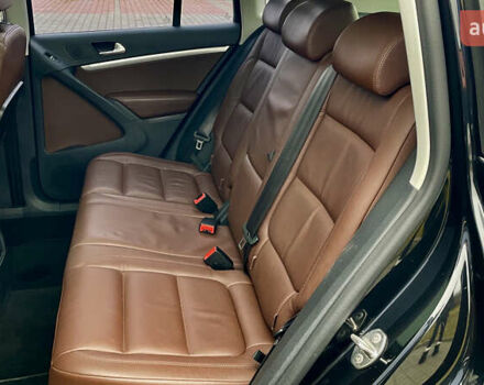 Чорний Фольксваген Тігуан, об'ємом двигуна 2 л та пробігом 223 тис. км за 16950 $, фото 39 на Automoto.ua