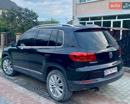 Черный Фольксваген Тигуан, объемом двигателя 1.98 л и пробегом 155 тыс. км за 12800 $, фото 1 на Automoto.ua
