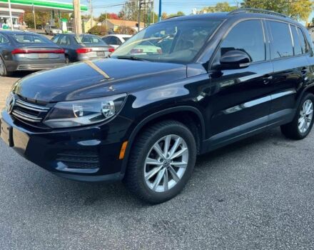 Чорний Фольксваген Тігуан, об'ємом двигуна 2 л та пробігом 74 тис. км за 4800 $, фото 2 на Automoto.ua