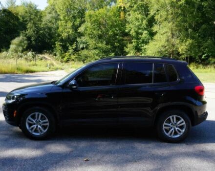 Черный Фольксваген Тигуан, объемом двигателя 2 л и пробегом 78 тыс. км за 7700 $, фото 2 на Automoto.ua