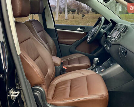 Чорний Фольксваген Тігуан, об'ємом двигуна 2 л та пробігом 223 тис. км за 16950 $, фото 41 на Automoto.ua