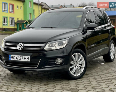Чорний Фольксваген Тігуан, об'ємом двигуна 2 л та пробігом 223 тис. км за 16950 $, фото 1 на Automoto.ua