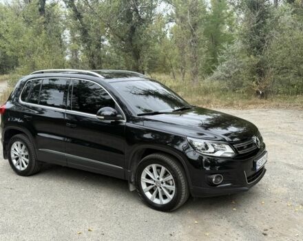 Чорний Фольксваген Тігуан, об'ємом двигуна 2 л та пробігом 97 тис. км за 20500 $, фото 1 на Automoto.ua