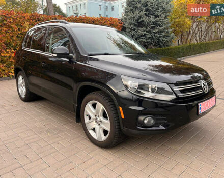 Чорний Фольксваген Тігуан, об'ємом двигуна 1.98 л та пробігом 174 тис. км за 12750 $, фото 1 на Automoto.ua