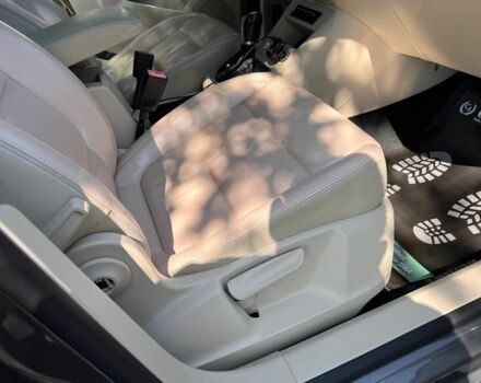 Черный Фольксваген Тигуан, объемом двигателя 1.8 л и пробегом 170 тыс. км за 12700 $, фото 11 на Automoto.ua