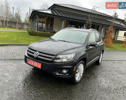 Черный Фольксваген Тигуан, объемом двигателя 1.98 л и пробегом 143 тыс. км за 12400 $, фото 1 на Automoto.ua