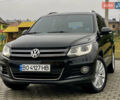 Чорний Фольксваген Тігуан, об'ємом двигуна 2 л та пробігом 223 тис. км за 16950 $, фото 1 на Automoto.ua